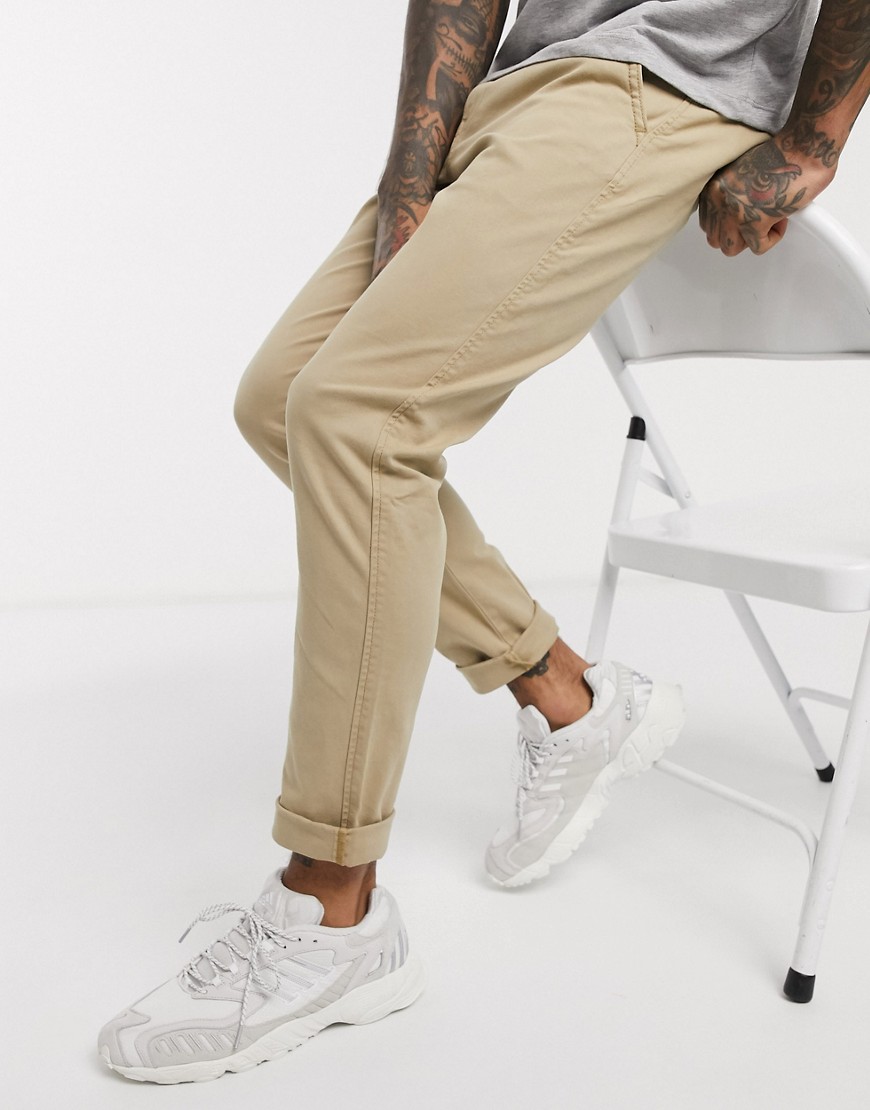 Levi's - Beige smalle chinos i tapered fit