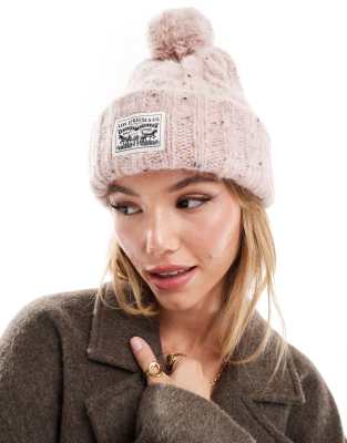 Levi's - Berretto rosa puntinato in maglia a trecce con pompon ed etichetta del logo