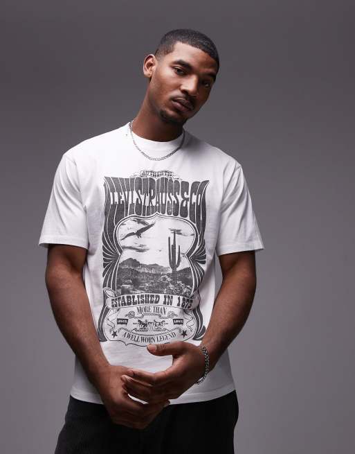 Levi's – Biały T-shirt o luźnym kroju z nadrukiem vintage z koncertowym motywem