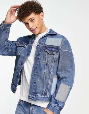 Levi's – Blå lappmönstrad truckerjacka i denim med vintage-passform