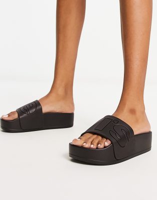 Levi's Bold flatform slider in black with large logo | ASOS