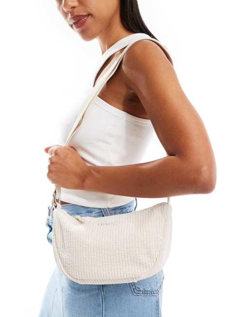 Levi's - Borsa piccola a tracolla in velluto a coste color crema con logo