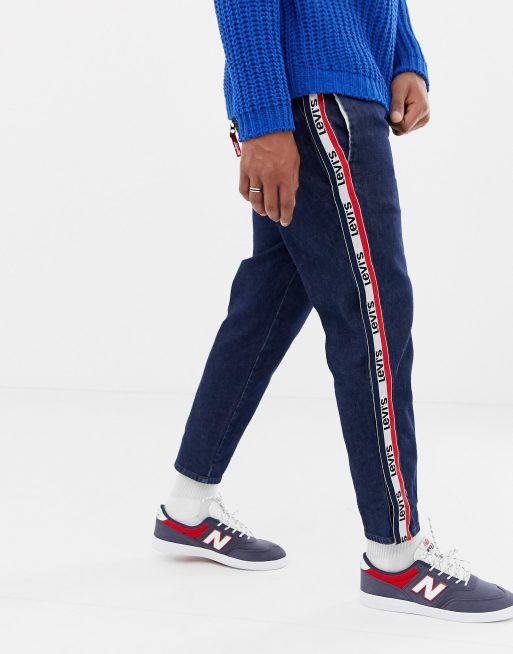 Levis logo stripe outlet jeans