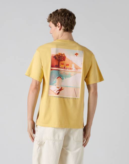 Levi's - Camiseta amarilla vintage con estampado gráfico de algodón, 1 de 4