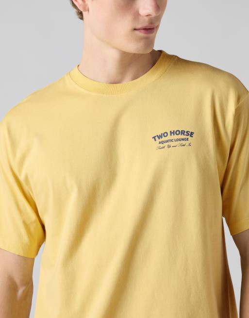 Levi's - Camiseta amarilla vintage con estampado gráfico de algodón, 3 de 4