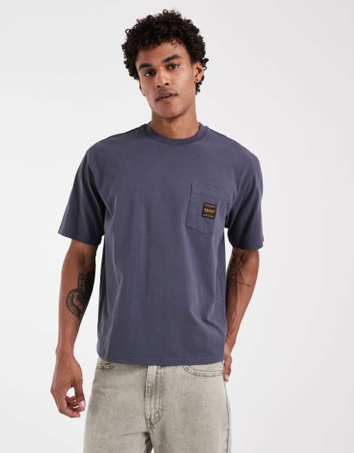 Levi's - camiseta Workwear con bolsillo en azul marino lavado, 2 de 5