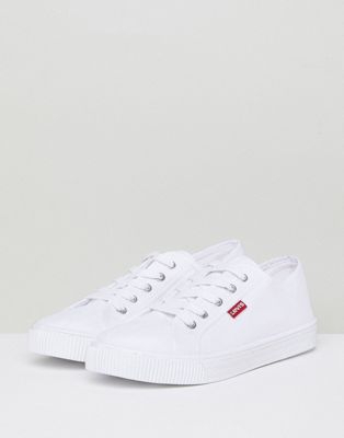 canvas shoe with red tab in white 