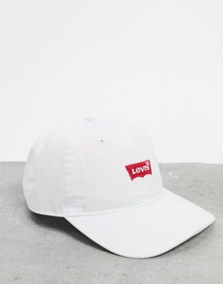 cap in white with small batwing logo 