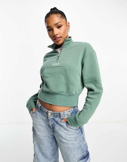 Levi's cropped half zip sweat with small logo in green | ASOS