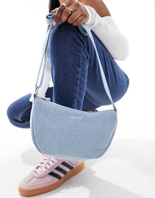 Levi's denim shoulder bag with logo in light blue | ASOS Levi's denim shoulder bag with logo in light blue | ASOS
