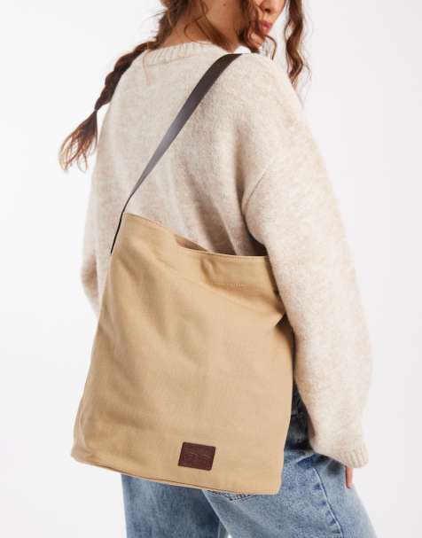 Levi's denim shoulder bucket bag in beige - view 1