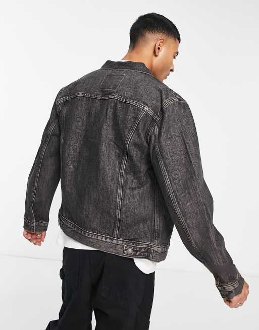 Levi's Denim Trucker jacket in black wash with pockets | ASOS