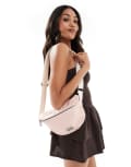 [Levi's] Levi's Devon crossbody bag in light pink One Size Light pink