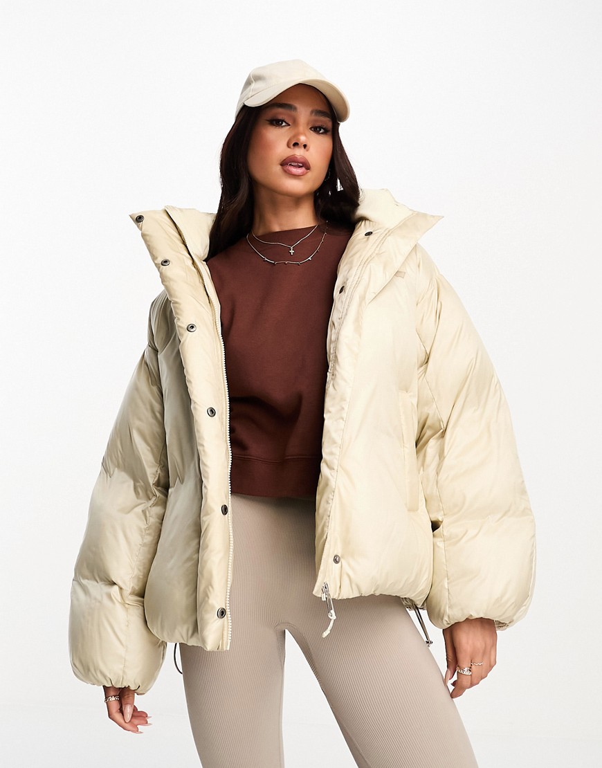 Levi’s Down Bubble hooded puffer jacket in cream with logo-White