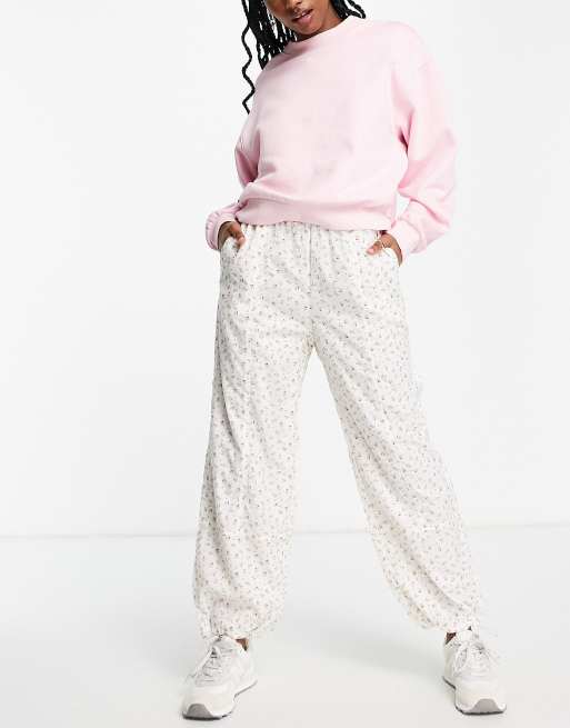 Pink best sale windbreaker pants