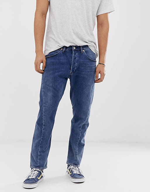 Levi's twist regular tapered jeans in mid wash | ASOS