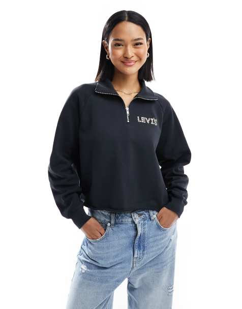 Levi's – Exklusiv bei ASOS – Pullover in Schwarz mit kurzem Reißverschluss und kleinem Logo mit Leopardenmuster - view 1