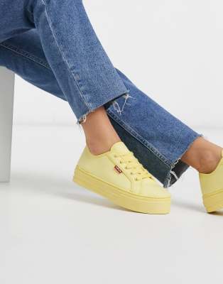 pastel yellow sneakers