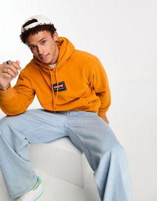 Levi's fleece hoodie in orange with central logo
