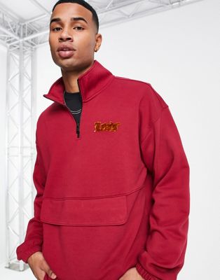 Levi's half zip in red with small logo