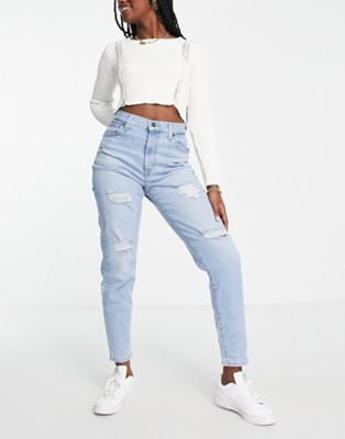 Levi's high waisted distressed mom jean in light wash blue - ASOS Price Checker