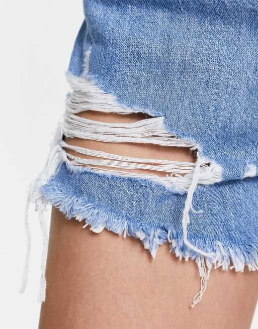 Levi's high waisted distressed mom shorts in light wash blue