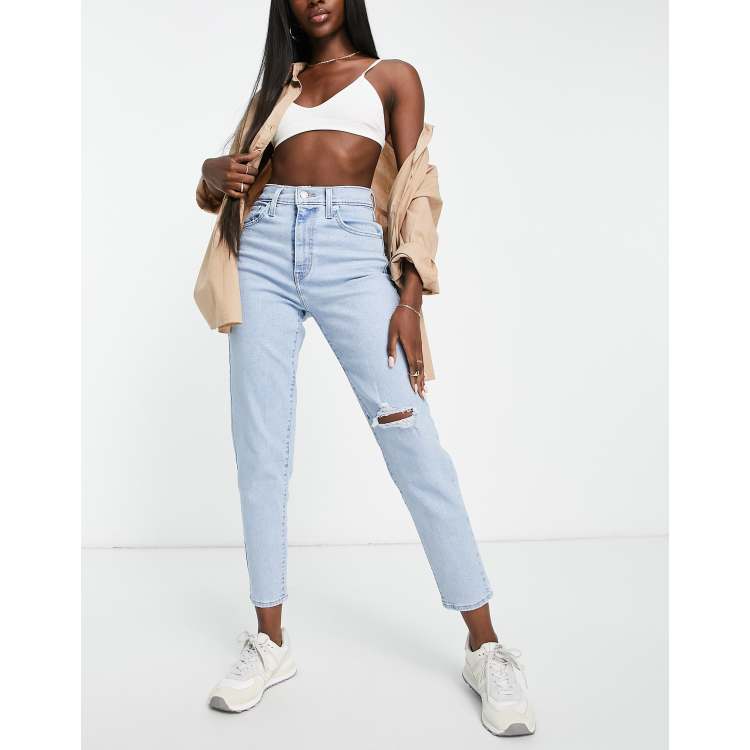 Levi's high waisted mom jeans in light wash blue | ASOS