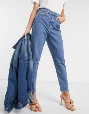 Levi's High Waisted Tapered Jeans In Mid-stone Wash-blues