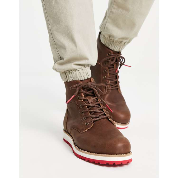 Levi's Jax Lux leather lace up boot with red tab in brown | ASOS