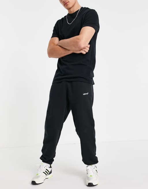 Levi's - Joggers in felpa con targhetta rossa con logo, colore nero minerale