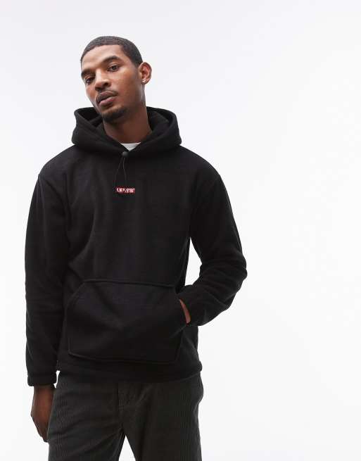Levi's – Kapuzenpullover aus Polarfleece in Schwarz mit mittigem kleinem Tab-Logo