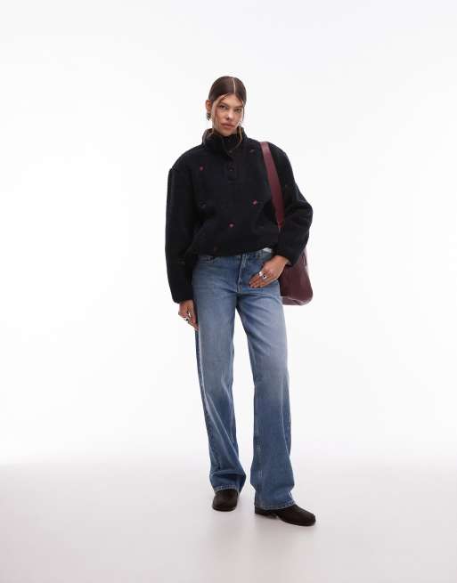 Levi's - Kasey - Fleece trui in zwart met bloemenprint, 2 van 4