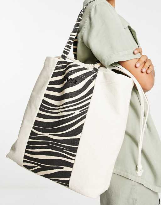 Levi's – Kremowa torebka typu tote w paski zebry z troczkami