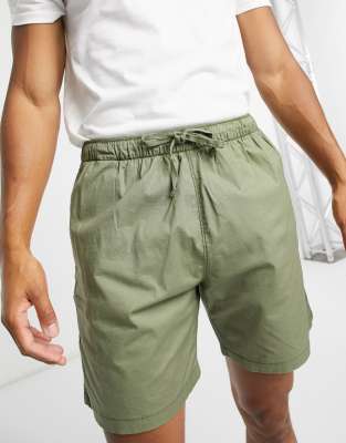 green levi shorts