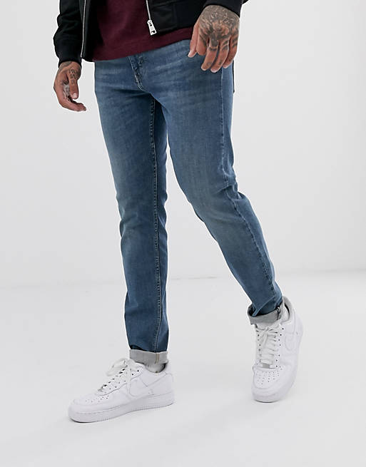 Levi's lo-ball 512 slim taper fit jeans in green abrade advance light wash  | ASOS