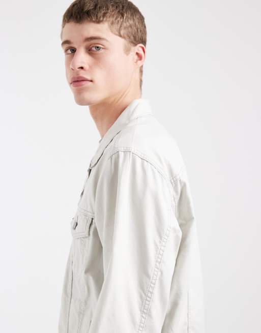 Levi's – Locker geschnittene Jeans-Truckerjacke in Ecru, 4 von 5