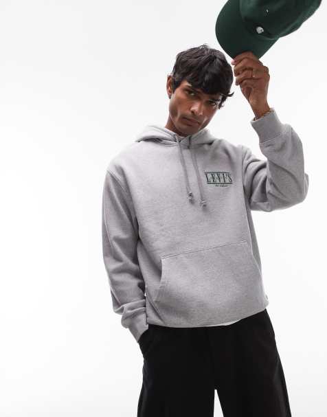 Levi's – Locker geschnittener Kapuzenpullover in meliertem Grau mit Serifen-Logo - view 1