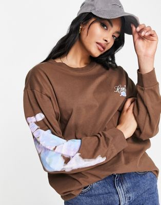 Levi's long sleeve blurry flower graphic top in brown