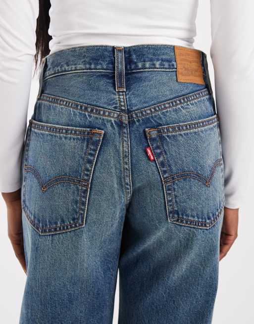 Levi's loose bootcut jeans with distressing in mid blue, 4 of 5