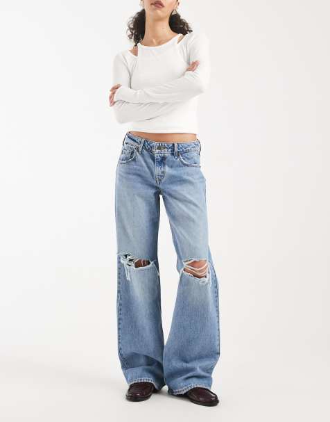 Levi's low loose jeans with rips in mid blue 