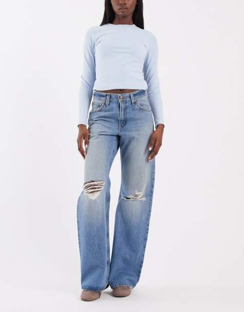 Levi's luźne jeansy bootcut middy z przetarciami w średnim odcieniu niebieskiego - view 1