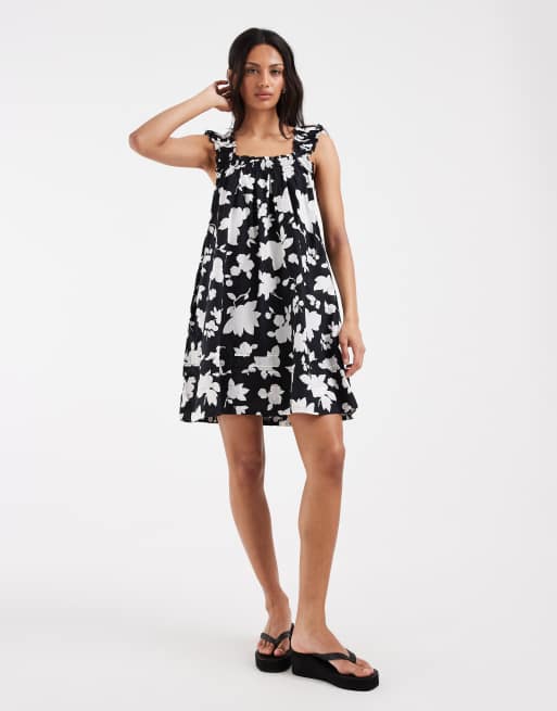 Levi's - Meg - Sort babydoll-minikjole med blomstermønster, 2 af 4