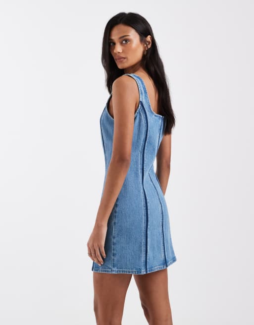 Levi's - Mellemblå forvasket minikjole i denim med syningsdetaljer og lynlås, 3 af 4