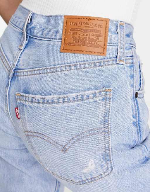 Levi's jeans with store rip under bum