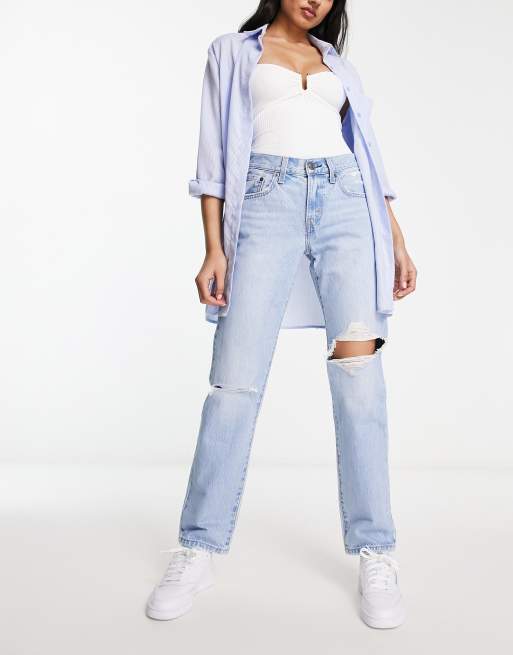 White ripped hot sale levi jeans