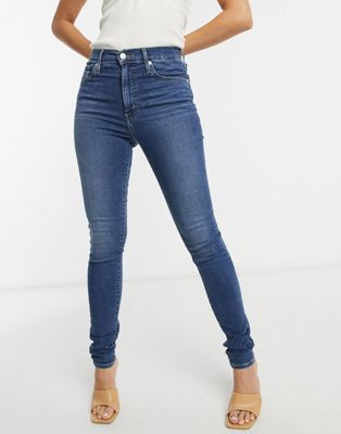 super skinny jeans in midwash blue | ASOS