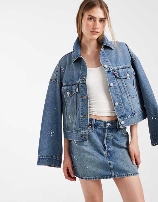 Levi's - Minigonna in denim azzurra decorata in coordinato