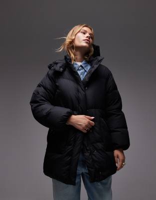 Levi's - Mittellanger Western-Puffermantel in Schwarz