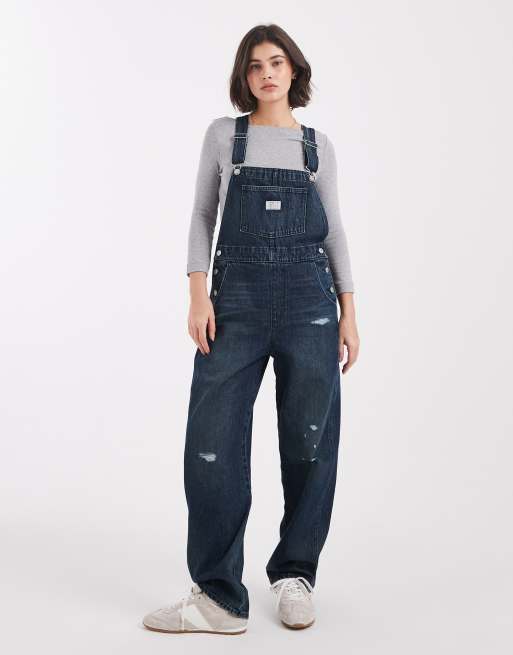 Levi's – Mörkblå, slitna hängselbyxor i vintage fit av denim