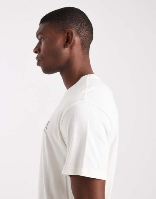 Levi's – Naturvit, avslappnad t-shirt med cowboy-logga baktill, 4 av 5